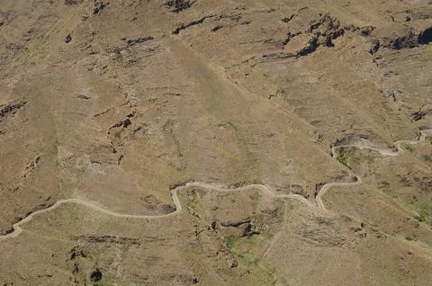 Winding road on a hillside. Stock Photos