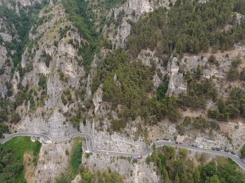 Winding road in the mountains, a beautiful view of a lot of trees Stock Footage 80840308