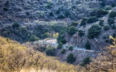 Winding road in the mountains in spring Stock Photos