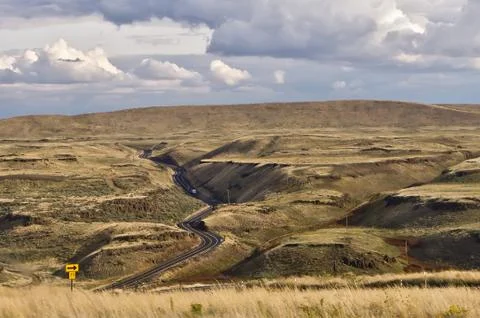 Winding road through desert of Eastern Washington State Stock Photos
