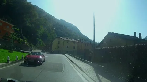 Winding road through local town drive - Northern Italy. Europe Adventure. Stock Footage 133013225