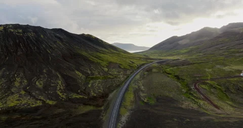 Winding Road Through Mossy Volcanic Mountains, Aerial View, Snæfellsnes Stock Footage 335077549