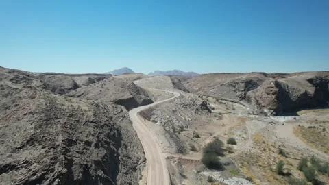 Winding Road Through Rocky Canyon at Gaub Pass - Aerial Rise Reveal, Namibia Stock Footage 346540366
