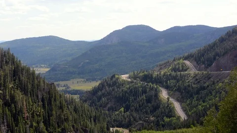Winding Road Wolf Creek Pass Highway 160 Switchbacks in Colorado on a Sunny Day Stock Footage 115743532