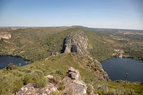 The winding Tejo River flowing through lush green hills Stock Photos