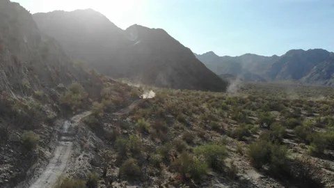 Winding through mountain desert road Vídeos de archivo 166662290