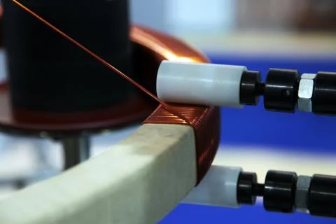 Winding of the toroidal coils Stock Photos