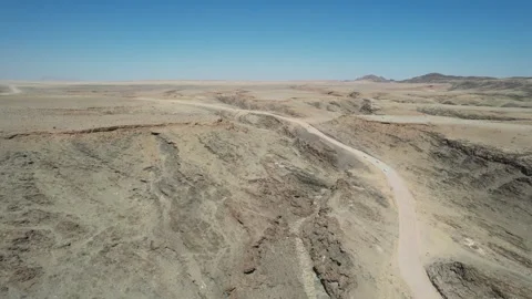 Winding Track Through Eroded Desert Hills - Aerial, Gaub Pass, Namibia Stock Footage 346540361