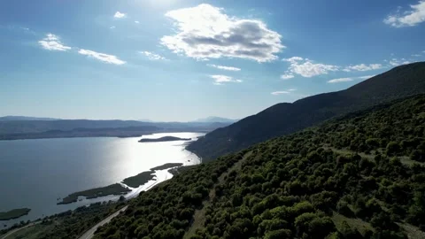 Winding Trails: Driving Through Vikos Gorge's Beauty Stock Footage 253780317