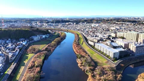 Winding Tsurumi River | Yokohama - 4K Aerial Video Stock Footage 329056677