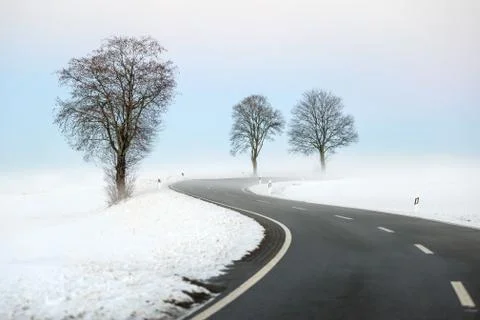 Winding winter road Stock Photos