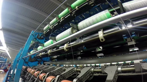 Winding the Yarn Onto Special Perforated Cones Stock Footage 63465762