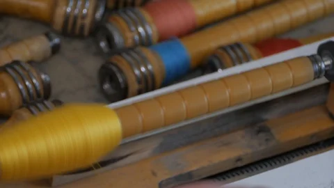 Winding yellow thread for the weaving shuttle 16 Video stock 126960449
