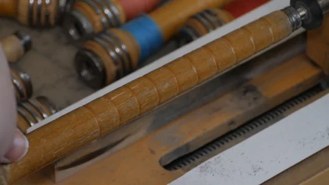 Winding yellow thread for the weaving shuttle 15 Stock Footage 126960861