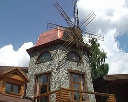 Windmill against a blue sky Stock Footage 24932864