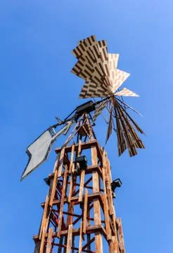 Windmill against blue sky Stock Photos