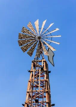 Windmill against blue sky Stock Photos