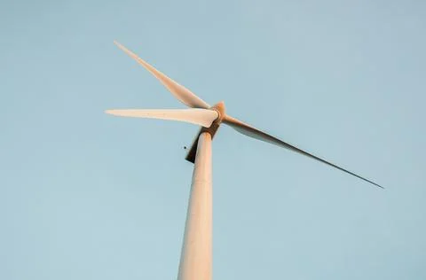 Windmill against cloudless blue sky Stock Photos