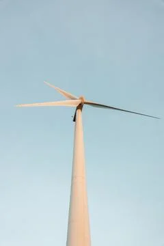 Windmill against cloudless blue sky Stock Photos