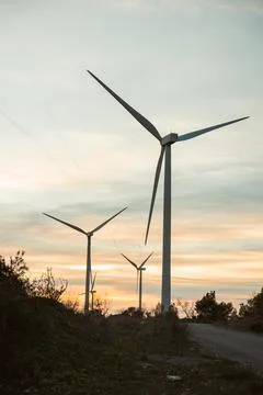 Windmill against cloudless blue sky Stock Photos