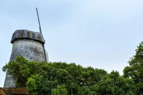 Windmill against the sky. Stock Photos