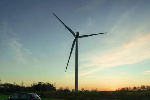 Windmill against sky Stockfoto's