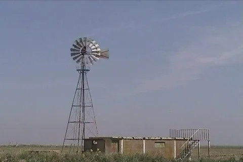 Windmill and barn Stock Footage 107463