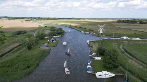 Windmill and Boats on River Stock Footage 262049994