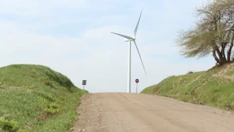 Windmill and a country road Stock Footage 10919989