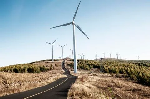 Windmill and highway Stock Photos