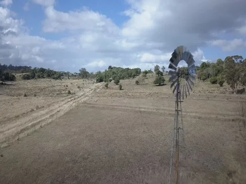 Windmill and Paddock close forward flight Stock Footage 78502053