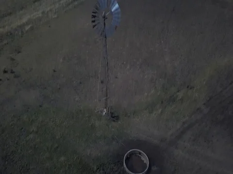 Windmill and Paddock gimbal zoom out Stock Footage 78502045