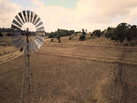 Windmill and Paddock slide shot GRADED Stock Footage 78502067
