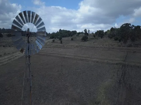 Windmill and Paddock slide shot Stock Footage 78502070