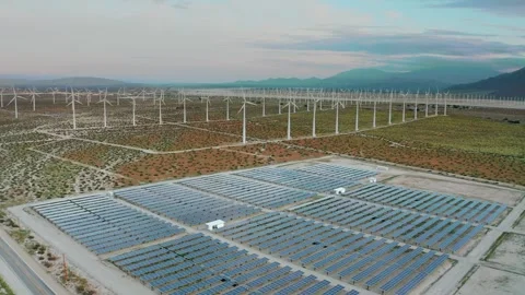 Windmill And Solar Panel Farm Producing Renewable Energy With Wind And Sun Stock Footage 347747976
