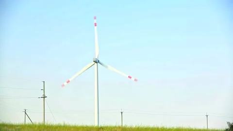 Windmill on the Background of Blue Sky on a Sunny Day Stock Footage 142388954