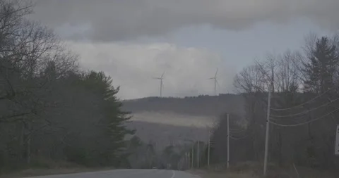 Windmill Background Car Passing Past Foreground Stock Footage 291717223