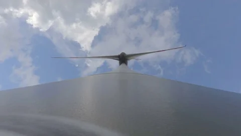 Windmill from below with the moving clouds on the background energy production Stock Footage 77537220