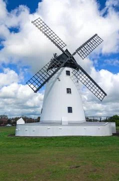Windmill with black sails Stock Photos