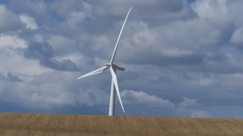 Windmill blowing with clouds in the background Stock Footage 112047783