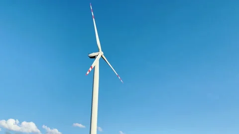 Windmill on blue sky background, generation of electricity from wind energy. 库存影片 235627643