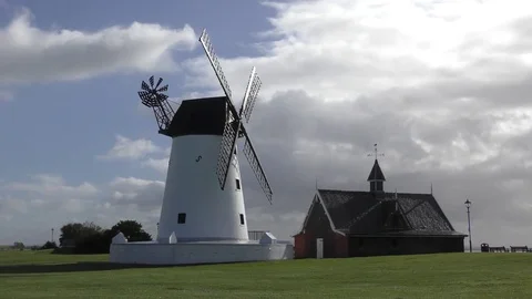 Windmill blue sky moving clouds England Stock Footage 80759685