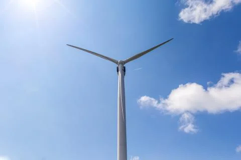 Windmill on a blue sky Stock Photos