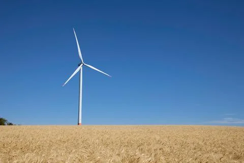 Windmill in the blue sky Stock Photos
