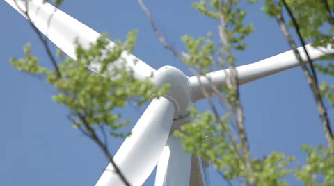 Windmill on Blue Sky with tree in the foreground! Stock Footage 40009419