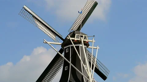 Windmill on blue sky, white clouds, Netherlands, Stock Footage 41815640