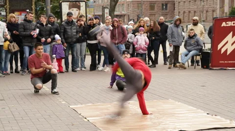 Windmill: Breakancers dancing on street - Khreshchatyk near Maidan Nezalezhnosti Stock Footage 68993281