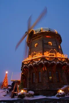 Windmill with christmass decorations Stock Photos