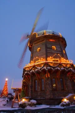 Windmill with christmass decorations Stock Photos