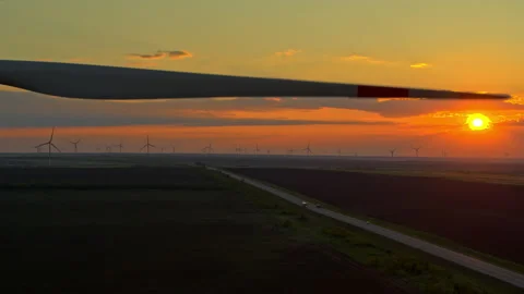 Windmill close-up, wind power plant at sunset from above, beautiful sky Stock-Footage 131255969